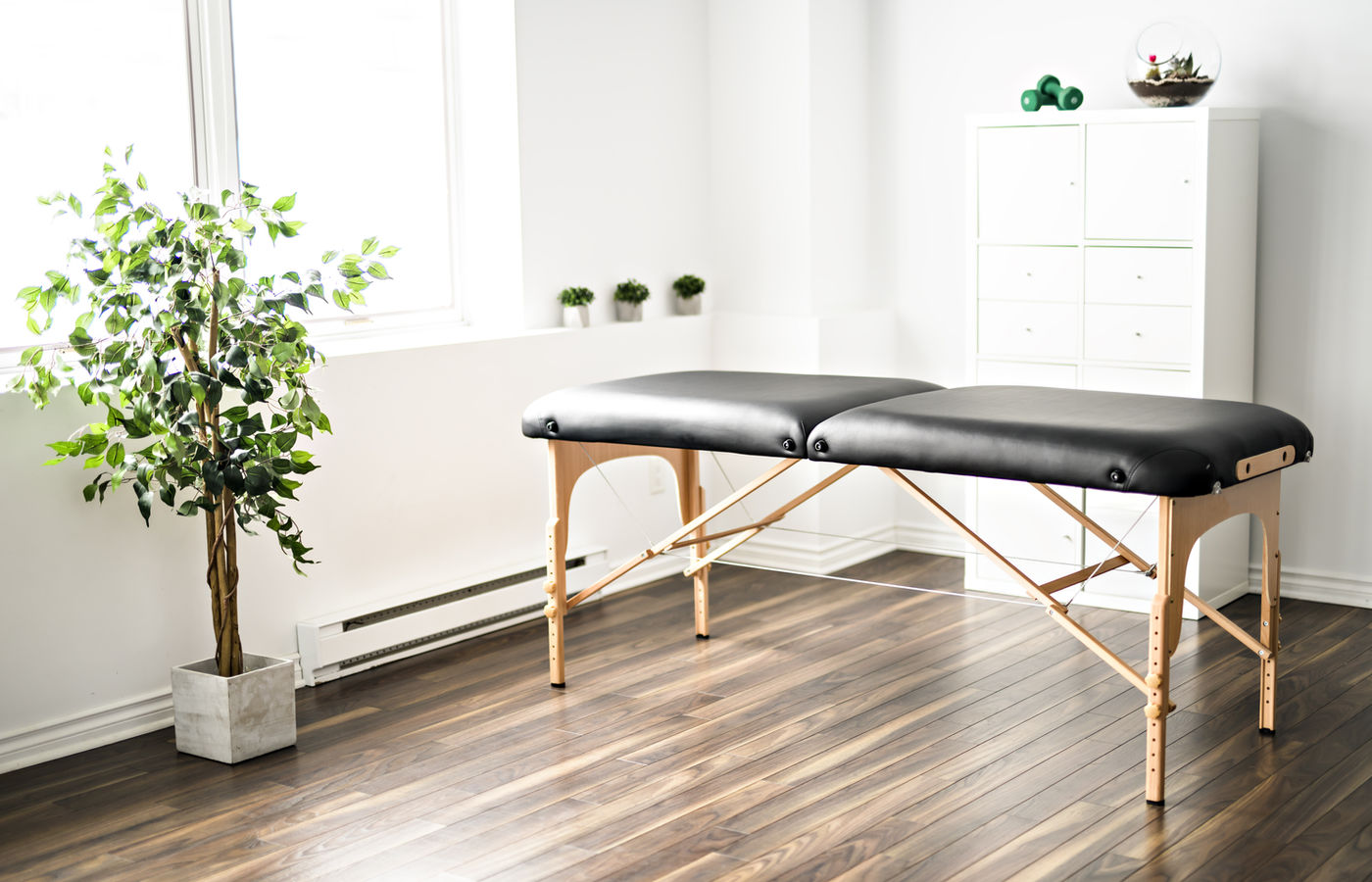 Mathieu's treatment room set up for therapeutic massage.