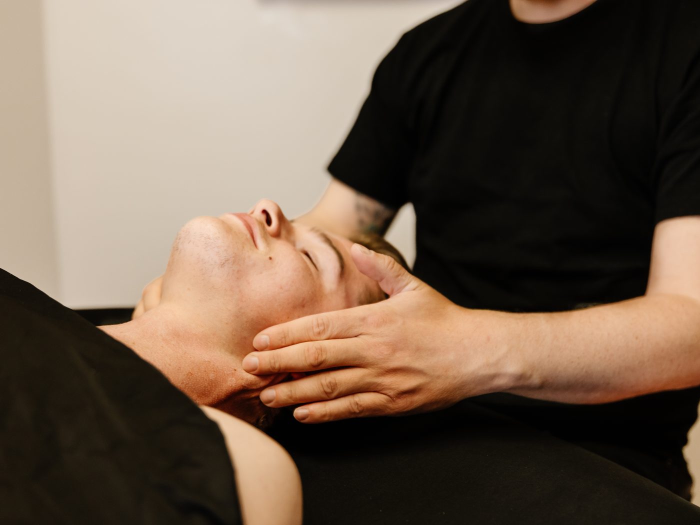 TMJ-related treatment, hands-on work at the jaw.